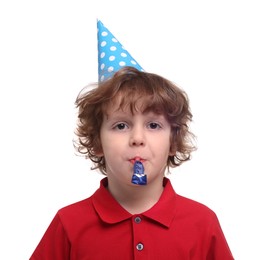 Photo of Cute little boy in party hat with blower on white background