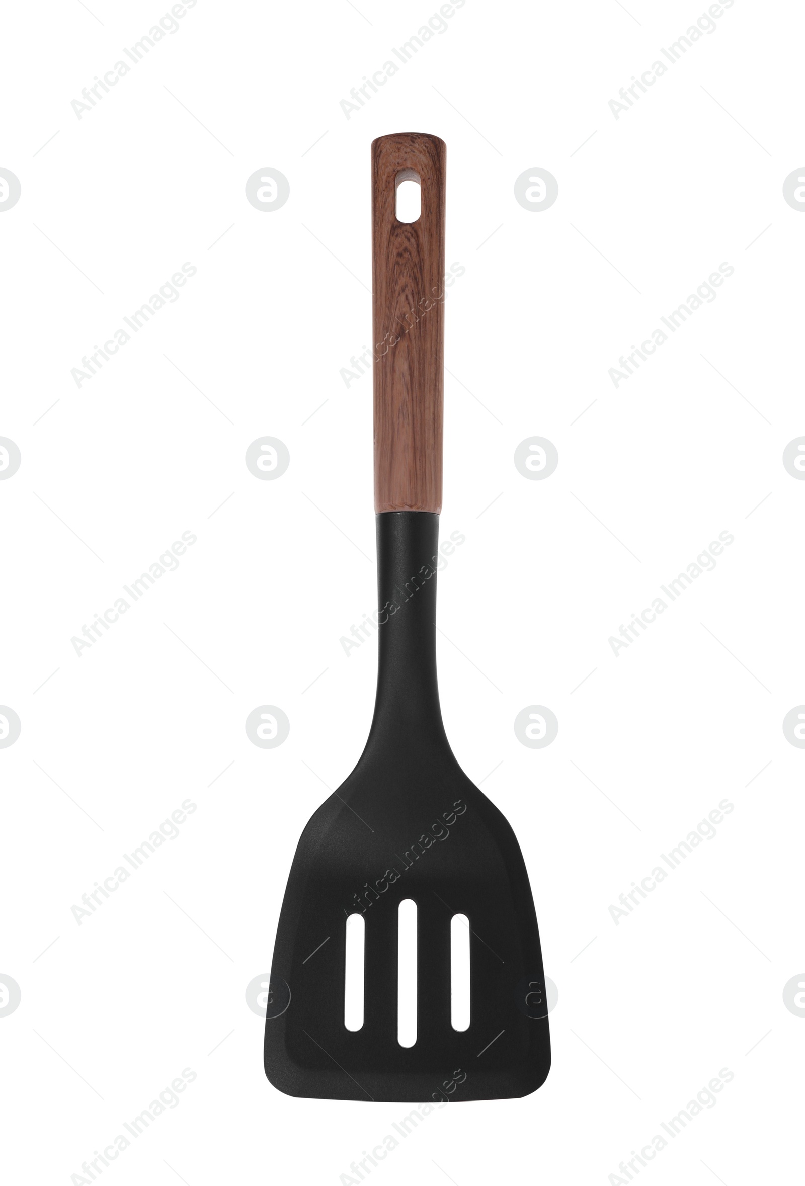 Photo of Slotted turner with wooden handle isolated on white. Kitchen utensil