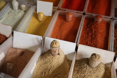 Assortment of different aromatic spices in containers