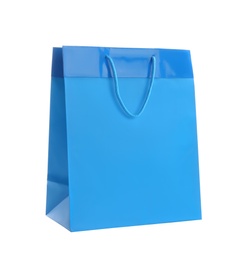 Blue paper shopping bag isolated on white