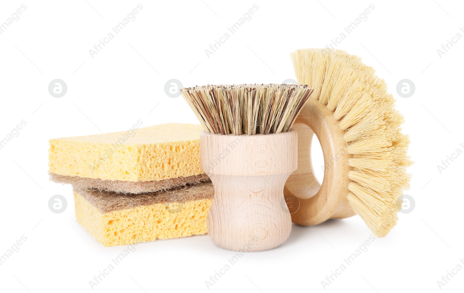 Photo of Cleaning supplies. Different brushes and sponges isolated on white