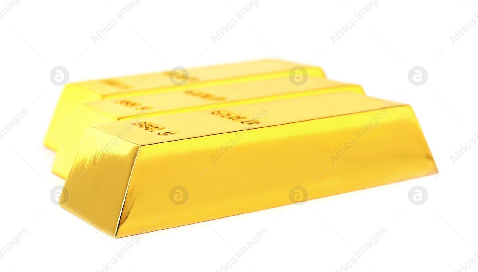 Photo of Precious shiny gold bars on white background