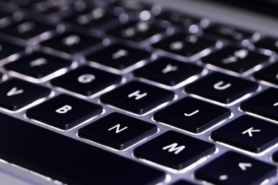 Photo of Closeup view of modern keyboard as background