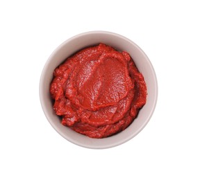 Photo of Bowl of tasty tomato paste isolated on white, top view