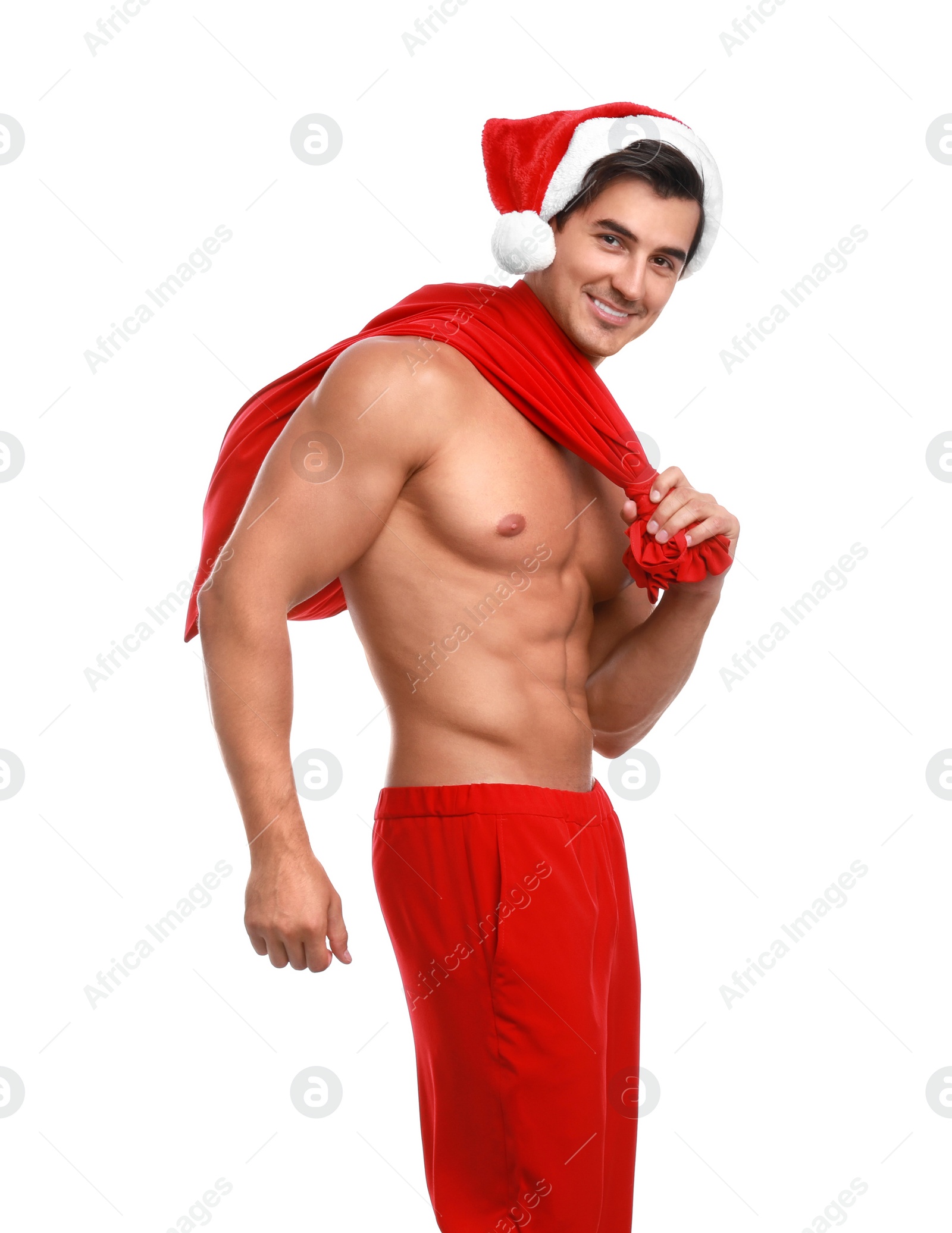 Photo of Sexy shirtless Santa Claus on white background