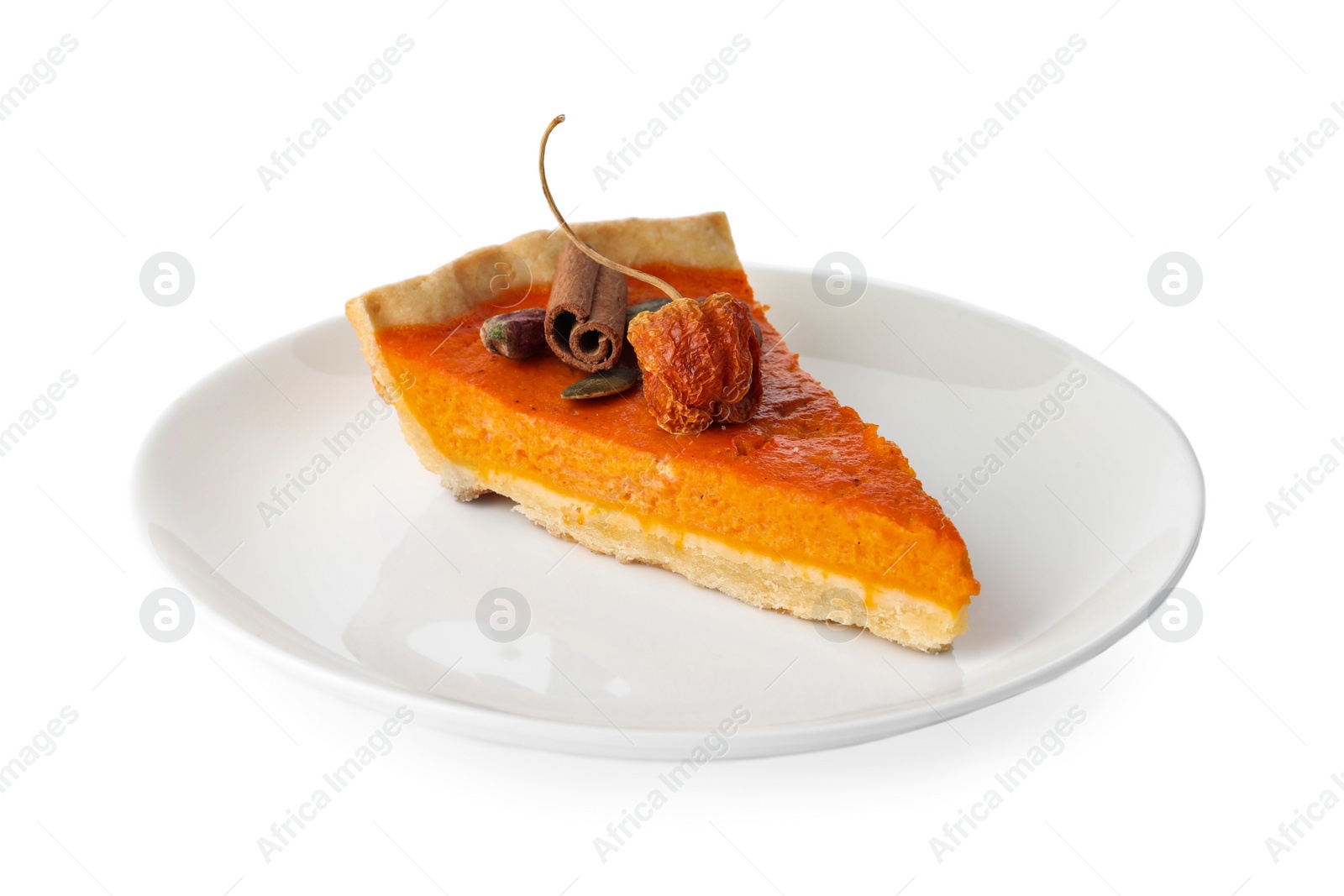 Photo of Slice of delicious homemade pumpkin pie isolated on white