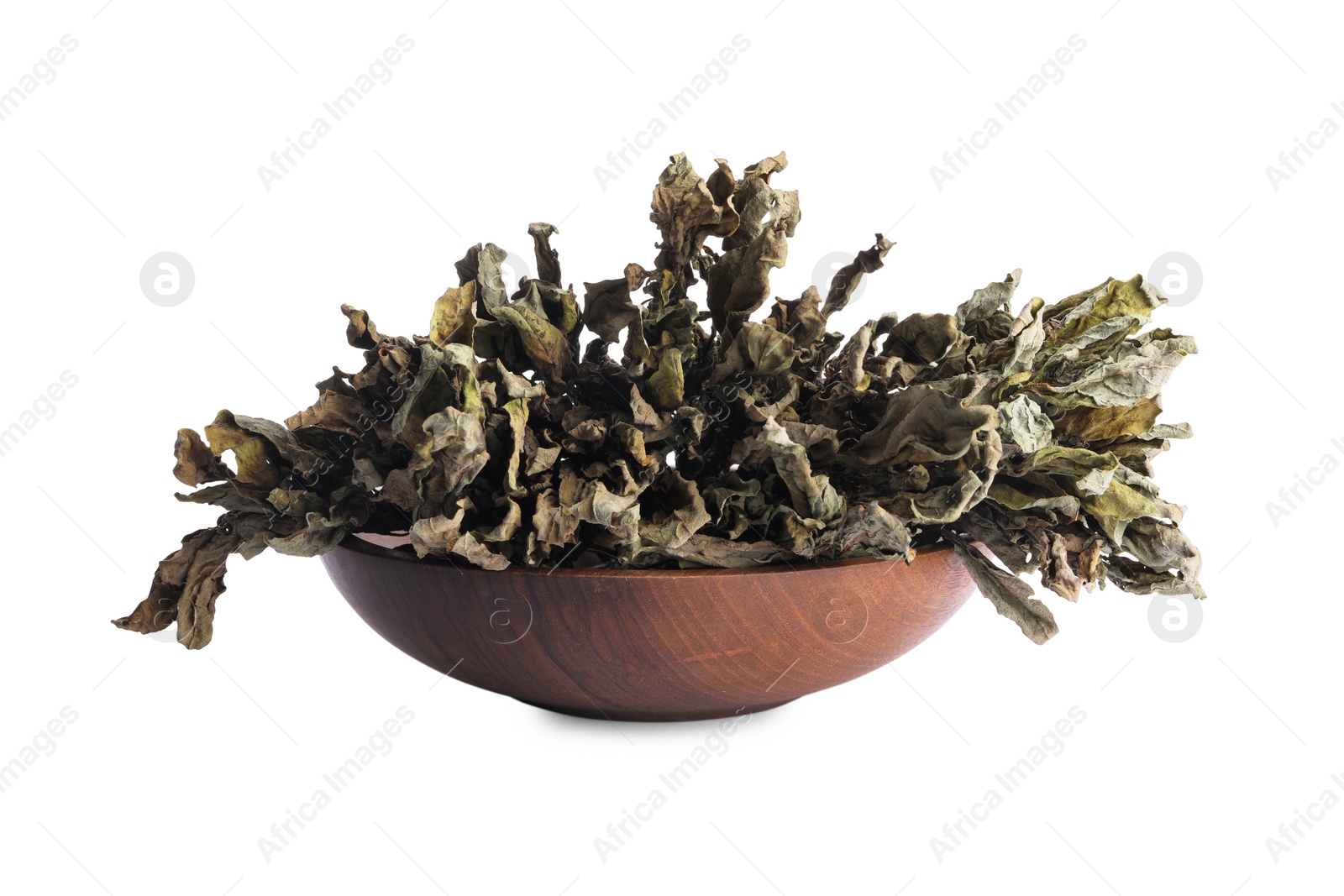 Photo of Dry basil in wooden bowl isolated on white