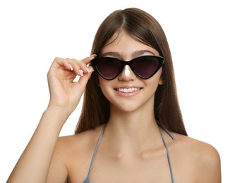 Photo of Teenage girl with sun protection cream on her nose against white background