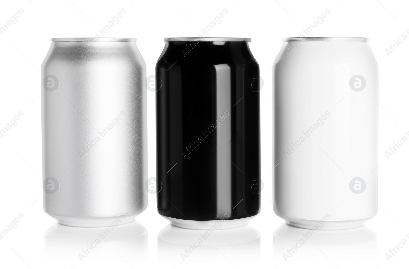 Photo of Aluminum cans with drinks on white background