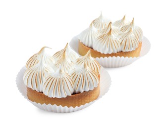 Photo of Tartlets with meringue isolated on white. Tasty dessert