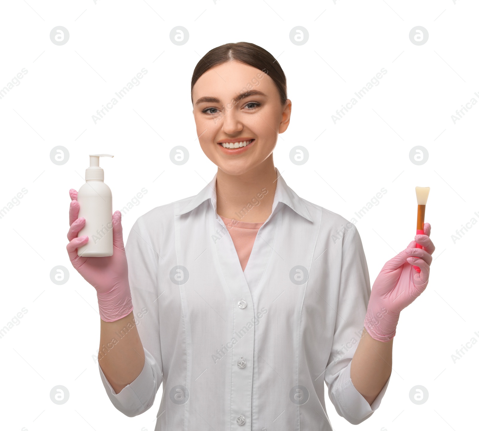 Photo of Cosmetologist with silicone brush and cosmetic product on white background