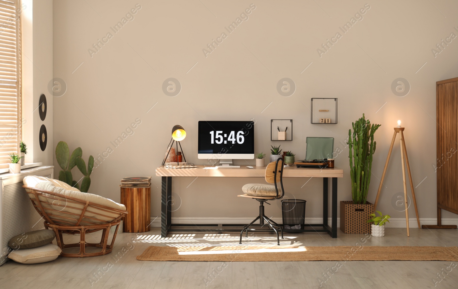 Photo of Room interior with comfortable workplace. Modern computer on wooden desk