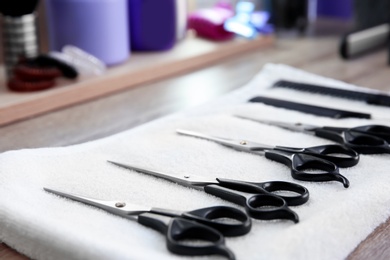 Different scissors at hairdresser's workplace