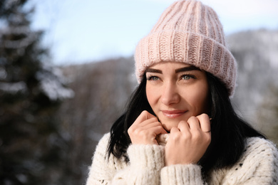 Photo of Portrait of beautiful young woman on winter day