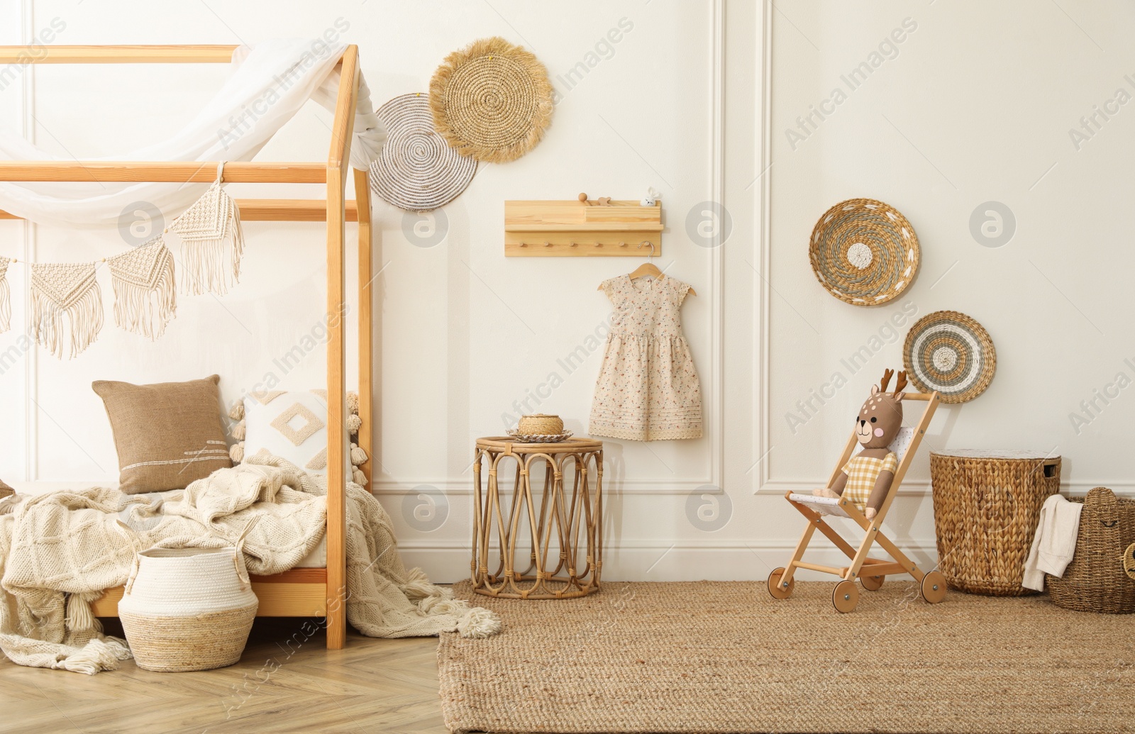 Photo of Stylish child room interior with house bed