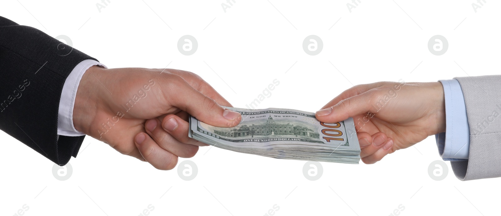 Photo of Money exchange. Man giving dollar banknotes to woman on white background, closeup