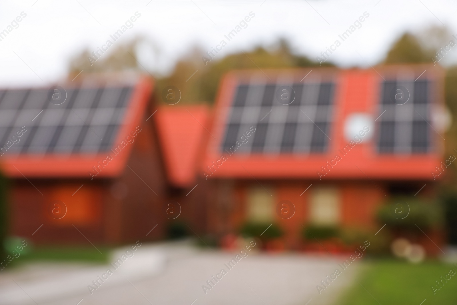 Photo of Beautiful houses outdoors, blurred view. Real estate for rent