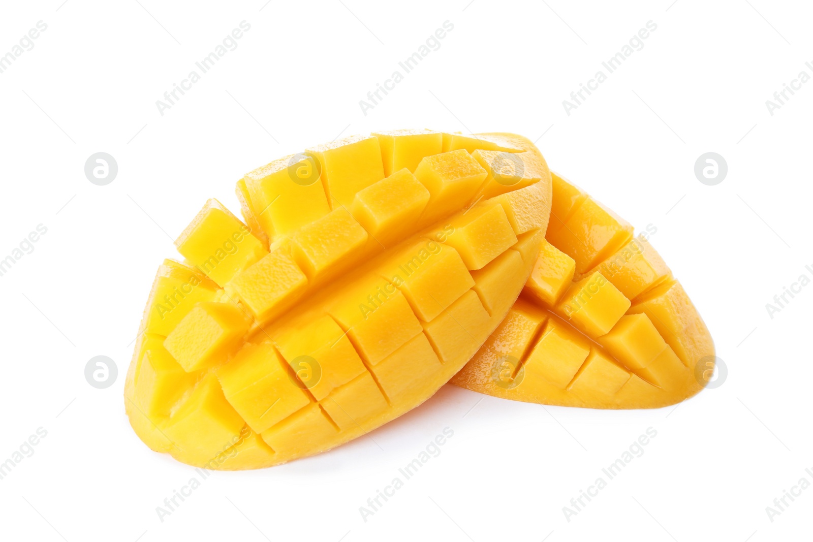 Photo of Fresh juicy mango halves on white background