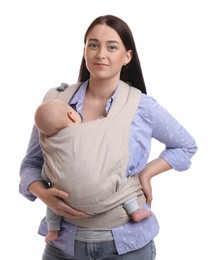 Photo of Mother holding her child in baby carrier on white background