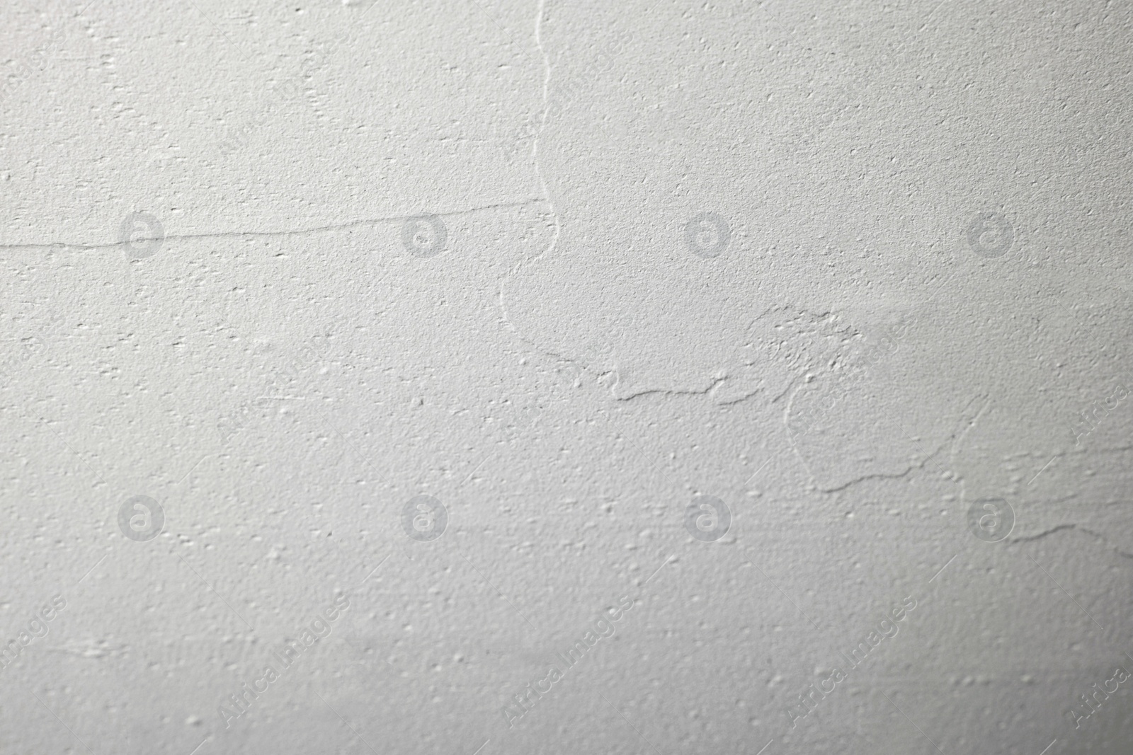 Photo of Wall covered with plaster as background, closeup