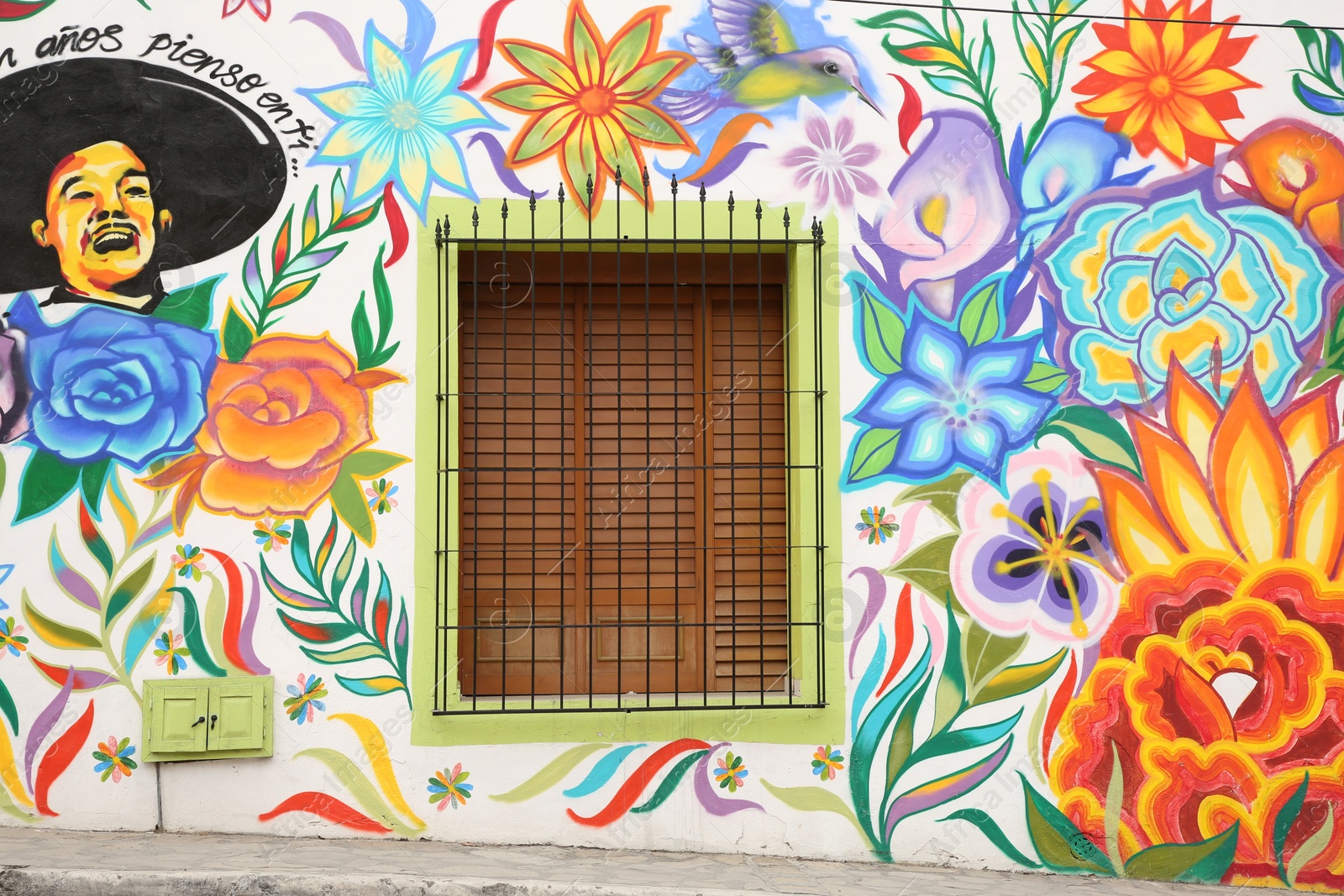 Photo of San Pedro Garza Garcia, Mexico – February 8, 2023: Building with beautiful traditional street art and window