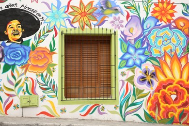 San Pedro Garza Garcia, Mexico – February 8, 2023: Building with beautiful traditional street art and window