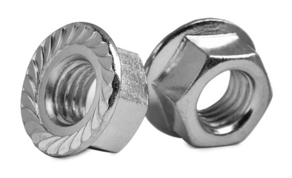 Photo of Two metal flange nuts on white background