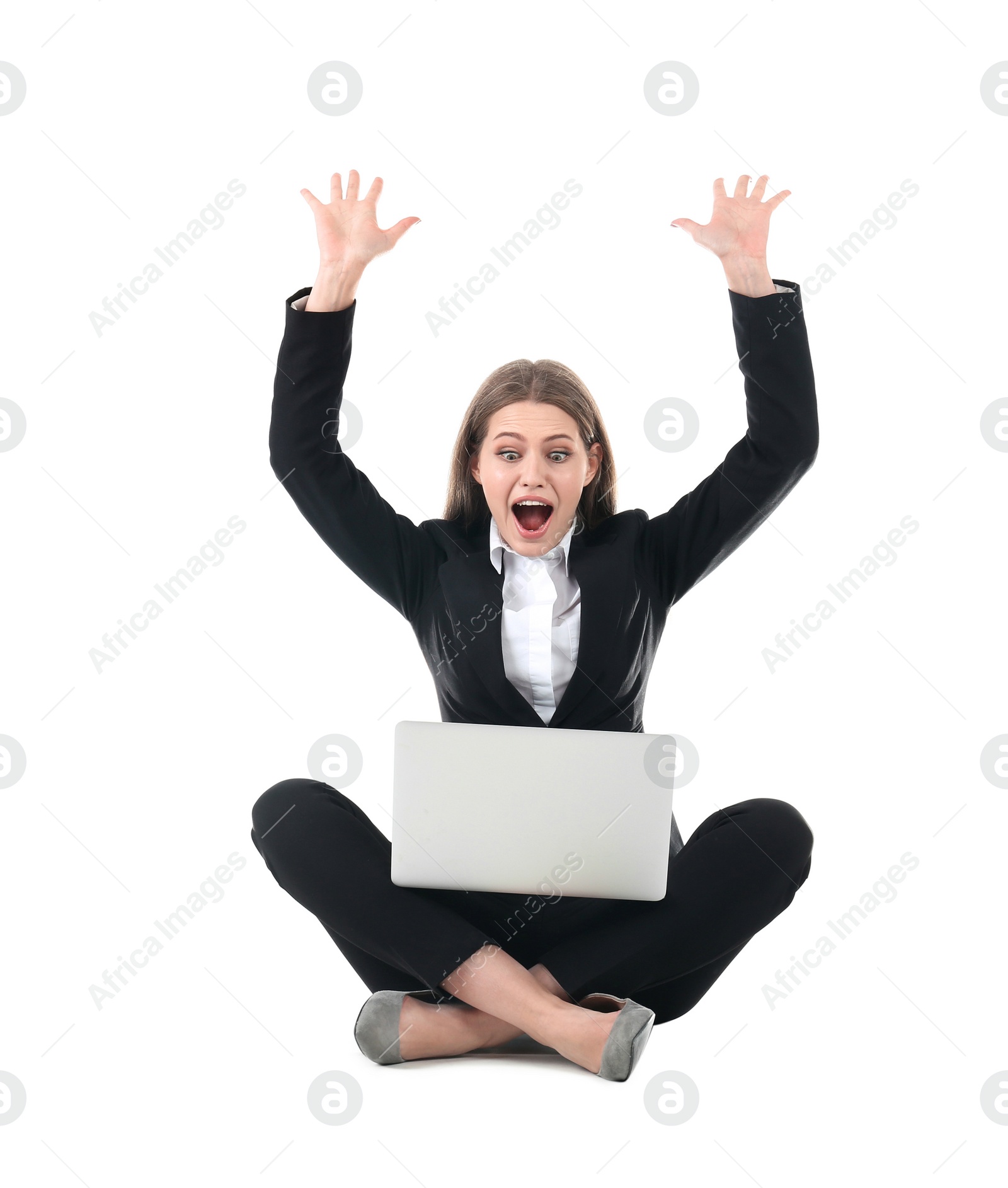 Photo of Emotional businesswoman in office wear with laptop celebrating victory on white background