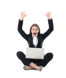 Emotional businesswoman in office wear with laptop celebrating victory on white background