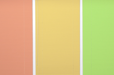 Image of Window with closed multicolor blinds as background