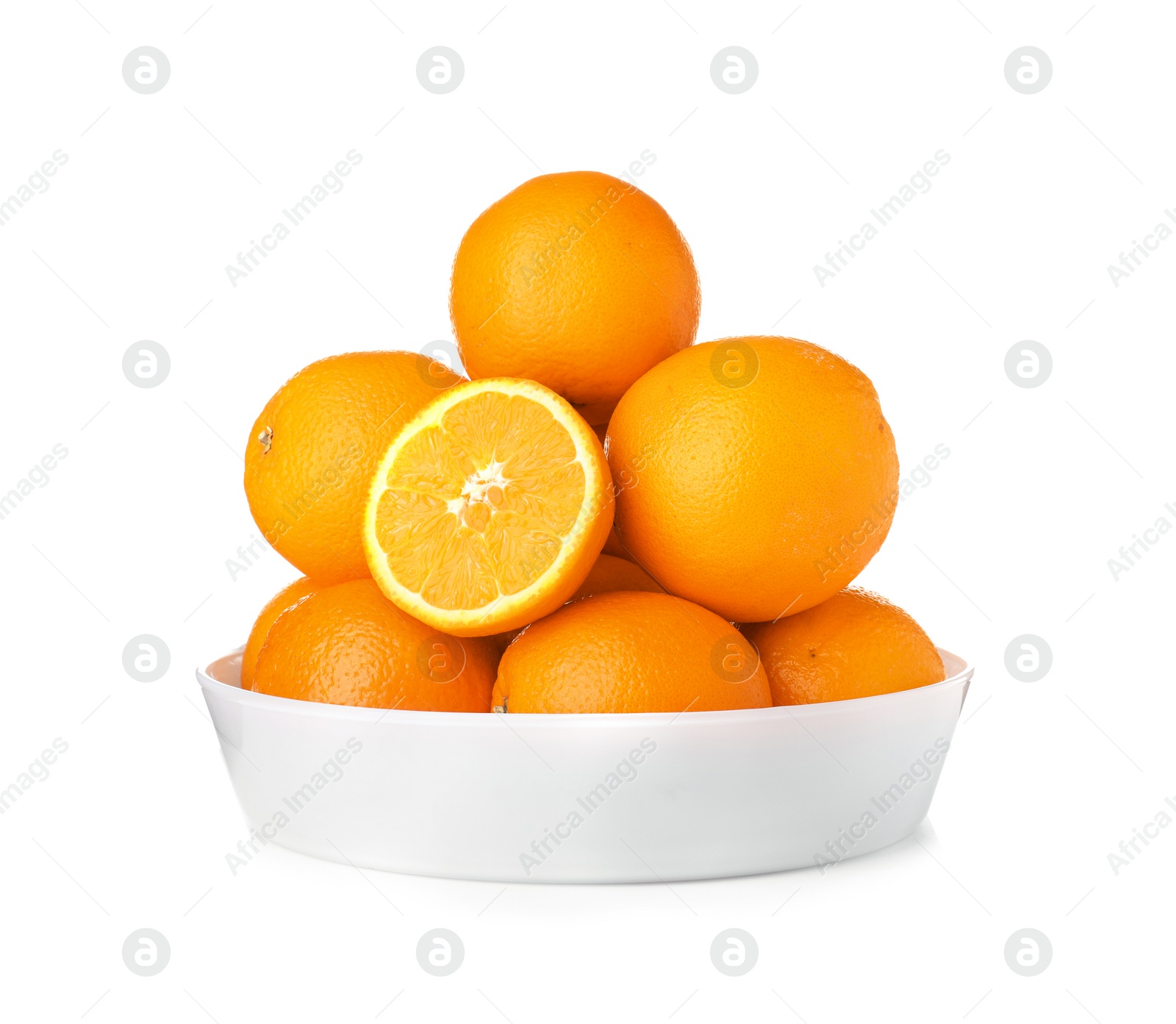 Photo of Fruit bowl with tasty oranges isolated on white