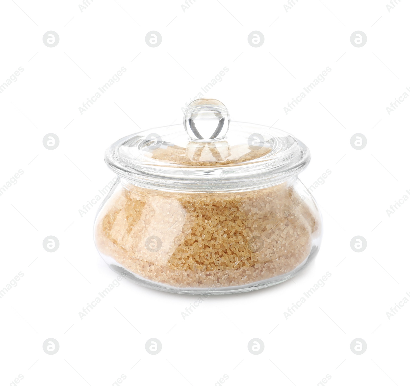 Photo of Glass bowl with brown sugar isolated on white