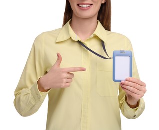 Woman pointing at blank badge on white background, closeup