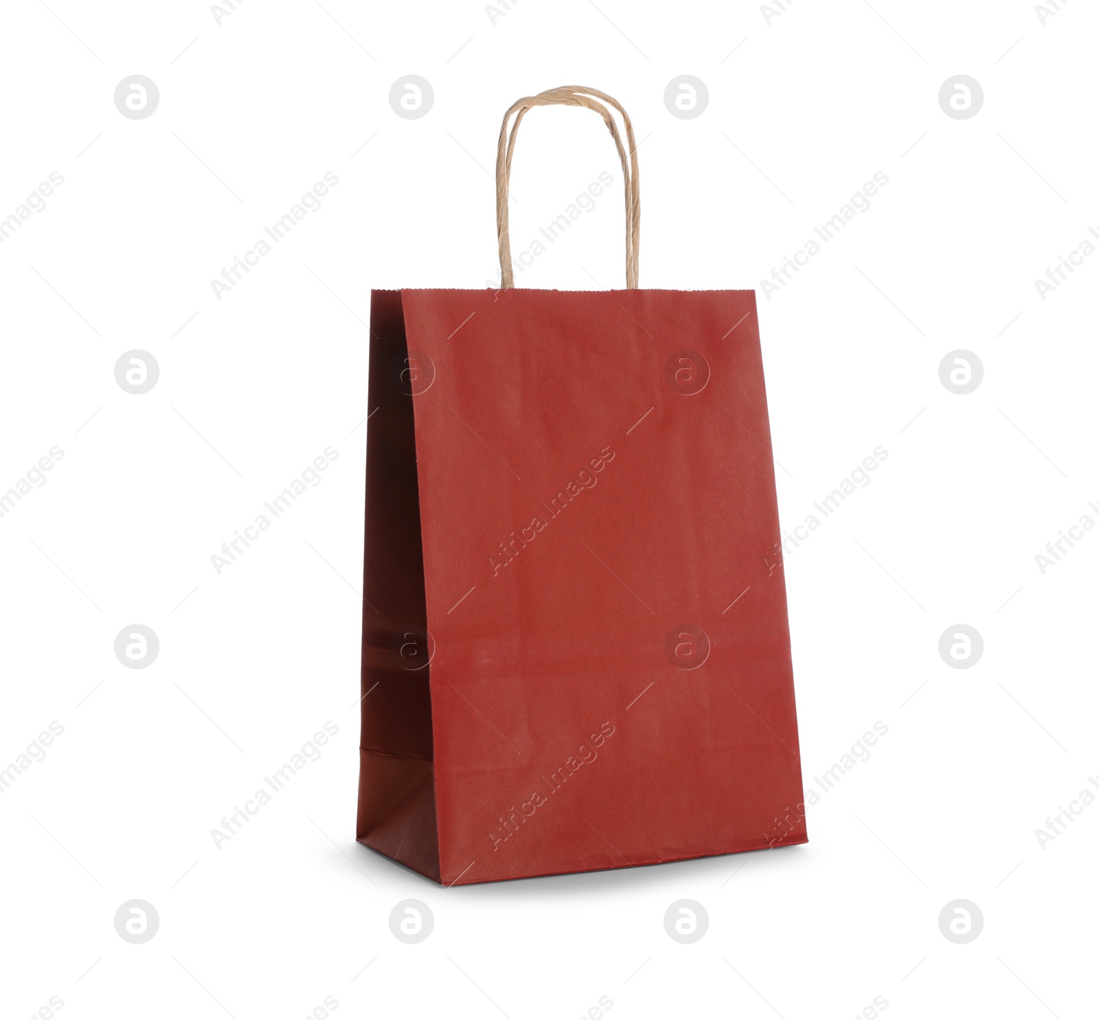 Photo of Blank red paper bag on white background. Space for design