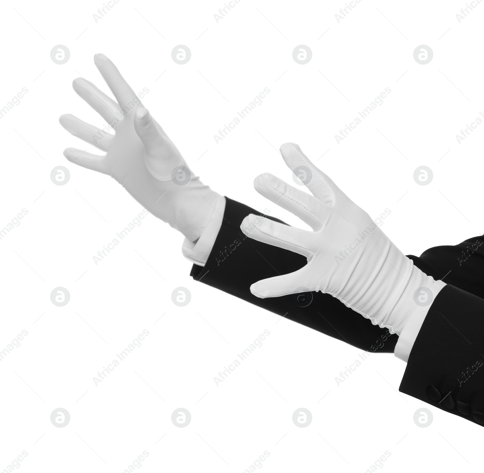 Photo of Magician holding something on white background, closeup