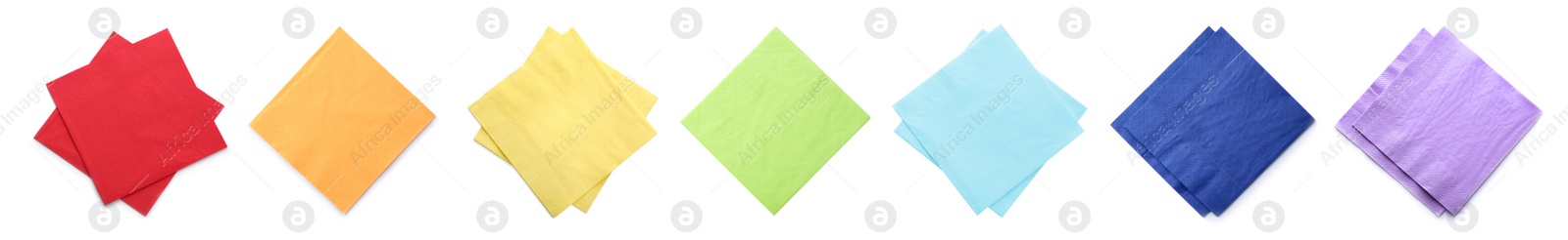 Image of Set with colorful paper napkins on white background, top view. Banner design