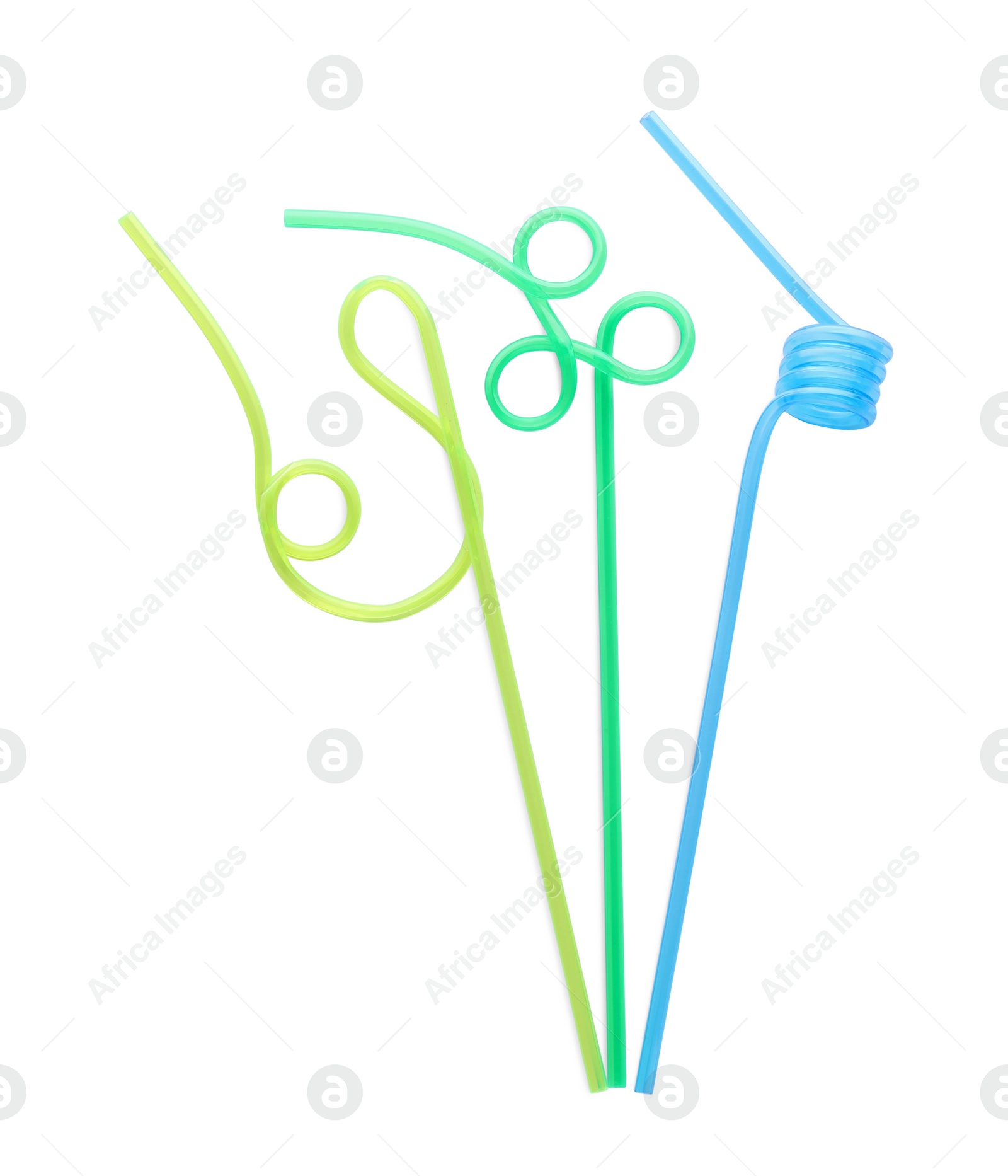 Photo of Color plastic cocktail tubes on white background, top view