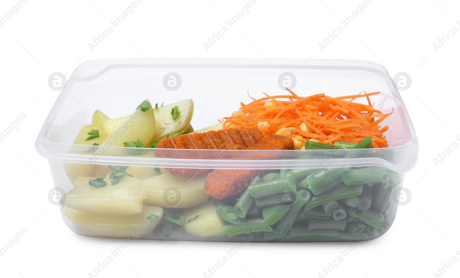 Photo of Tasty potatoes with cutlets and vegetables in plastic container isolated on white