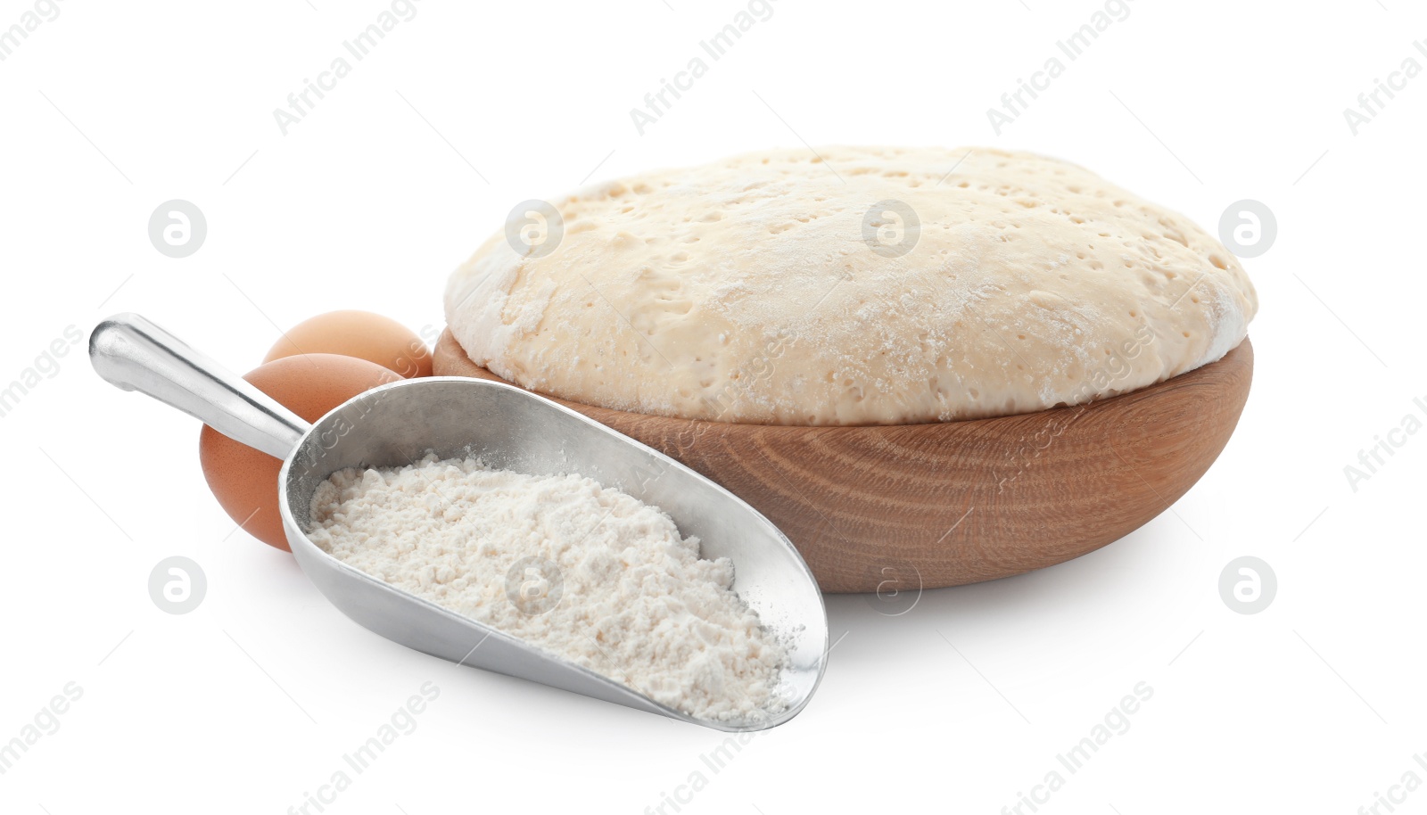 Photo of Dough, eggs and flour on white background. Cooking pastries