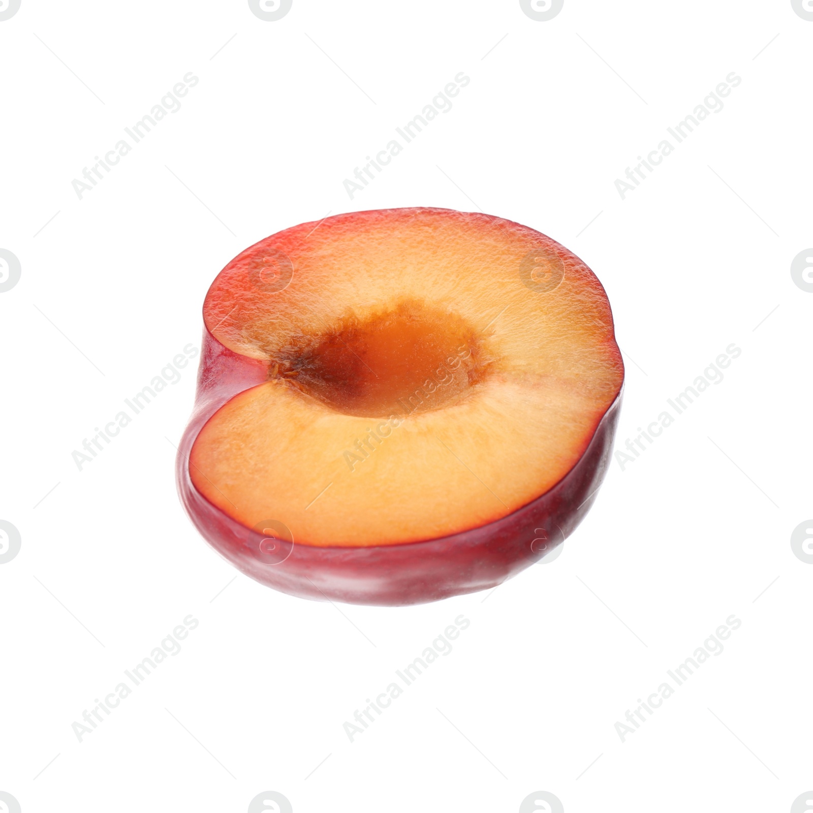 Photo of Half of ripe plum isolated on white