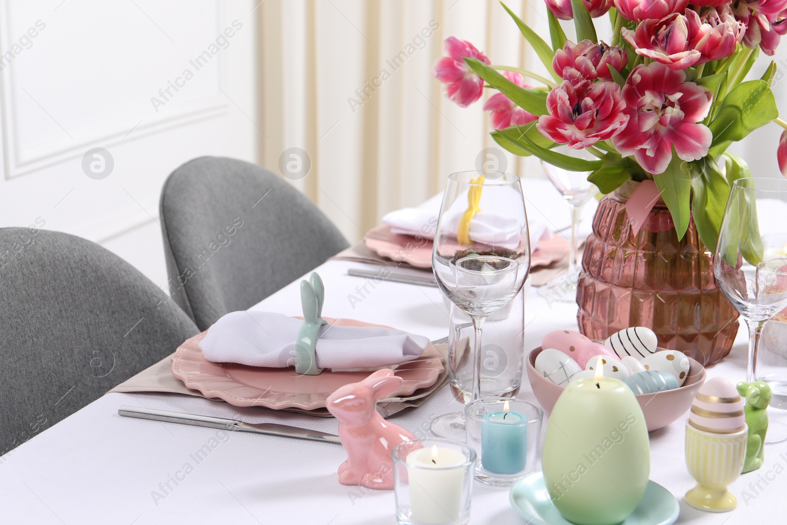 Photo of Festive table setting with beautiful flowers. Easter celebration