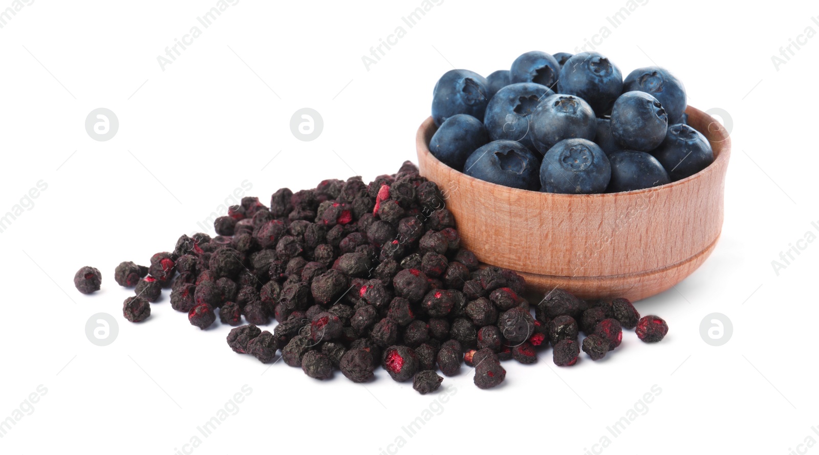 Photo of Sweet sublimated and fresh blueberries on white background