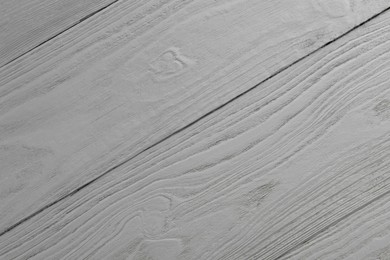 Texture of light grey wooden surface as background, closeup
