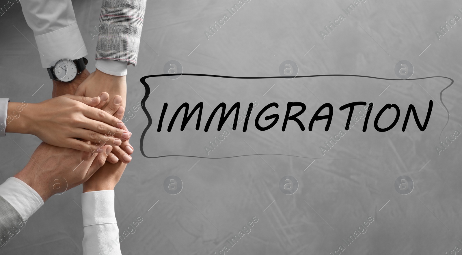 Image of Immigration concept. People holding hands together, top view