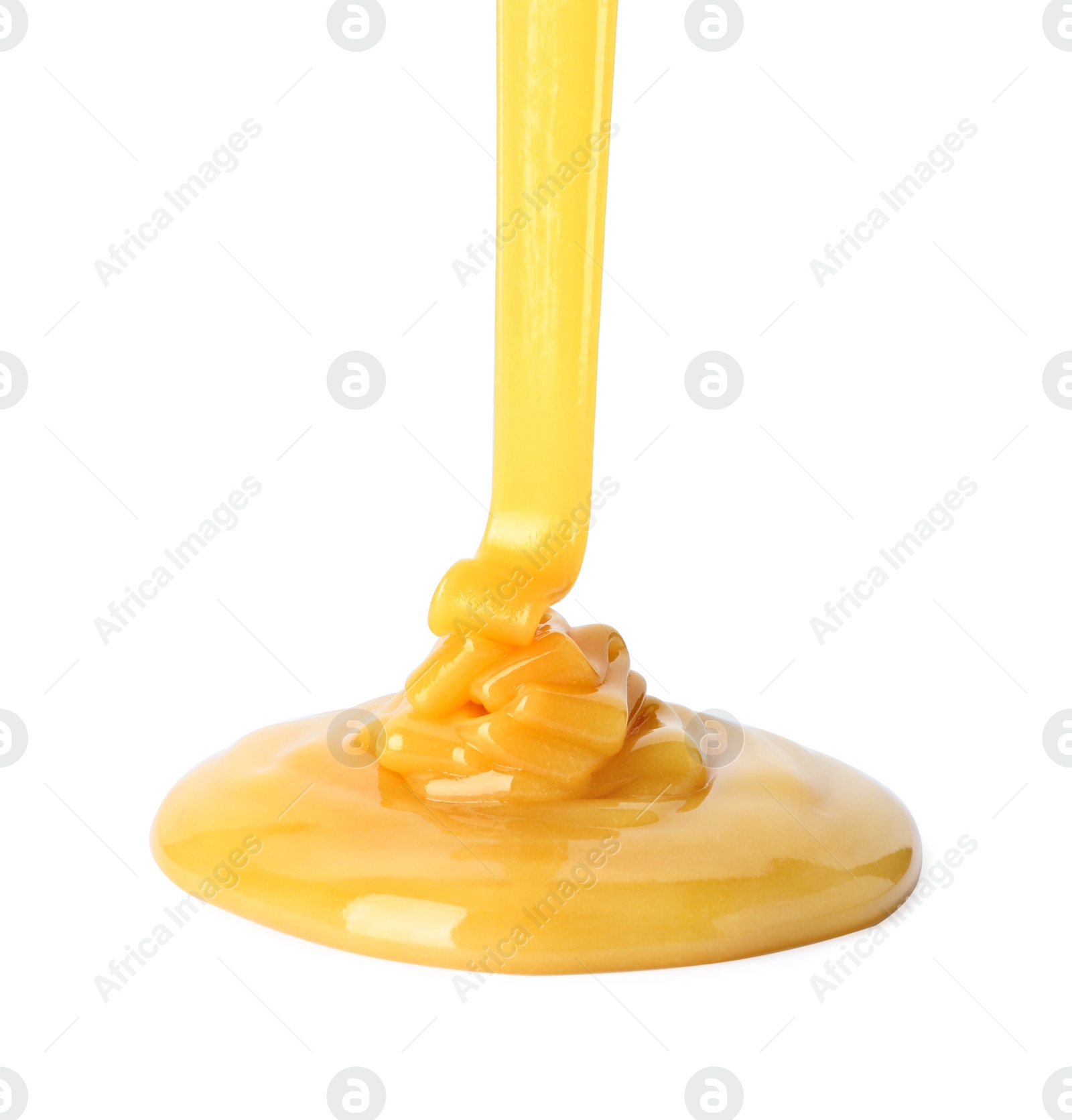 Photo of Pouring fresh sweet honey on white background