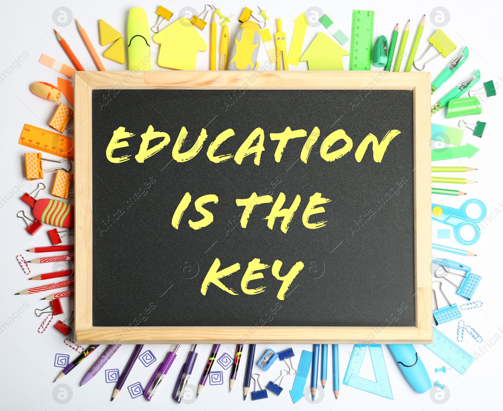 Image of Different school stationery and small chalkboard with phrase EDUCATION IS THE KEY on white background, top view. Adult learning