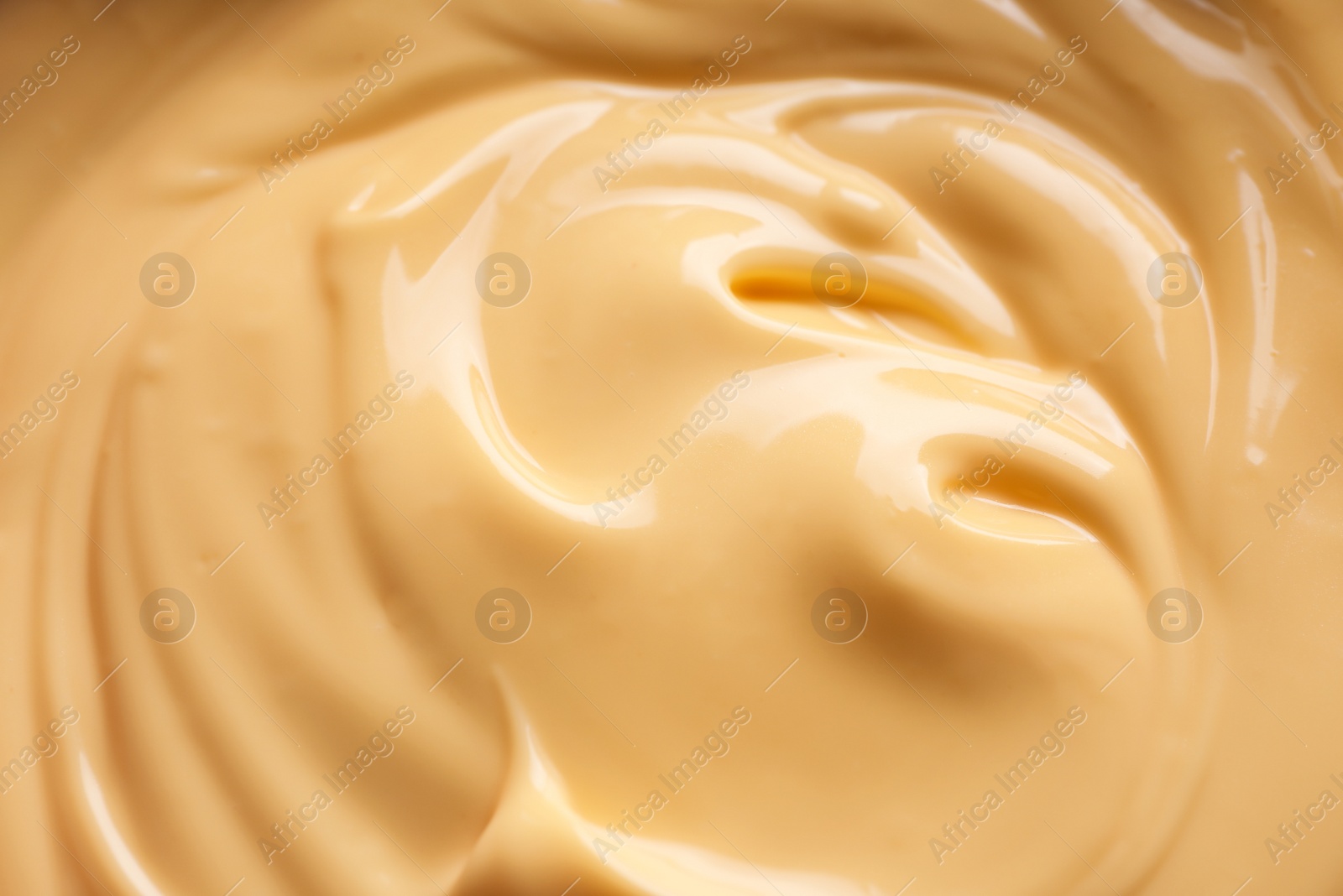 Photo of Delicious cheese fondue as background, top view