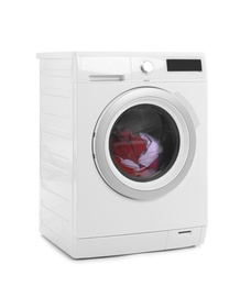 Photo of Modern washing machine with laundry on white background