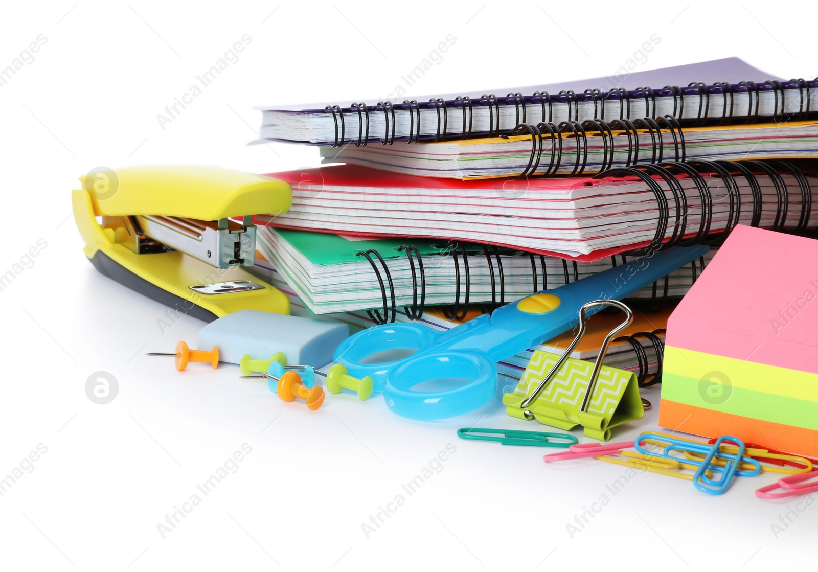 Photo of Different colorful stationery on white background. Back to school