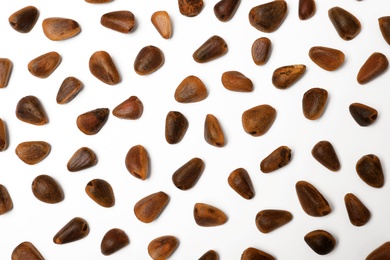 Photo of Composition with pine nuts on white background, top view